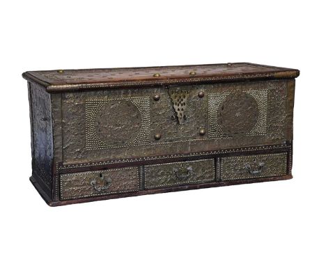 A Brass-Studded Teak or Hardwood Zanzibar Chest, early 20th century, decorated and embellished with engraved and chased brass