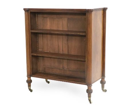 A Regency Mahogany Free-Standing Double-Sided Open Bookcase, early 19th century, of rectangular form with reeded edge and rou