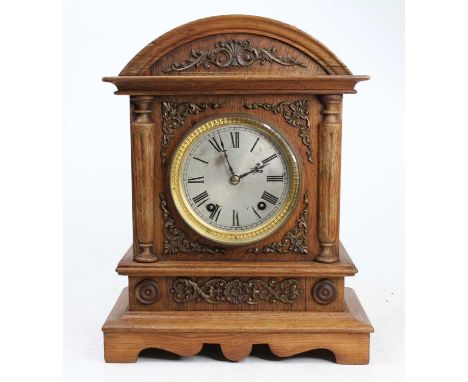 A Winterhalder &amp; Hofmeier oak cased bracket clock, circa 1900, the case with metal mounts, the 30-hour brass movement wit