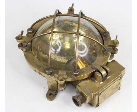 An antique brass ship's bulkhead light, height 28cm