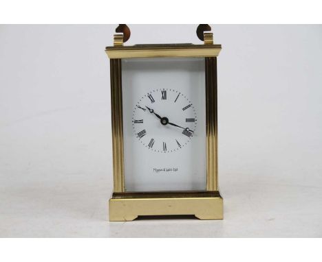 A Mappin &amp; Webb lacquered brass carriage clock, late 20th century, having visible platform escapement and single barrel g