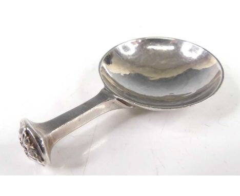 An Arts &amp; Crafts hammered silver caddy spoon, maker AE Jones, Birmingham 1926, 17.5g, 6.3cm