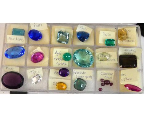 A box of mixed loose stones, to include oval ruby cabochons, amethyst, citrine, smoky quartz, prasiolite, blue and colourless