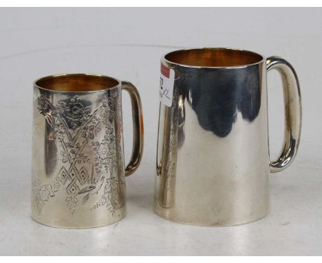 An Edwardian silver cylindrical christening mug, undecorated, maker William Hutton &amp; Sons Ltd, h.9cm; together with a sma