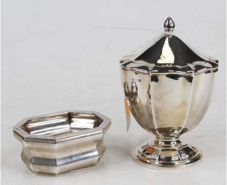 An Edwardian silver pedestal tea caddy, with hinged cover, h.12.5cm; together with a Chester silver table salt, 8cm, gross we
