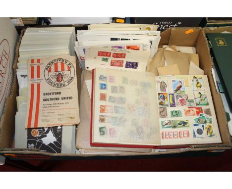 A mid 20th century red bound stamp album, contents to include examples from Belgium, Czechoslovakia, Sumatra, and other Royal