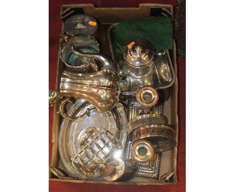 A box of assorted plated wares, to include entree dishes, wine sleeve, coaster, pair of Old Sheffield Plate candlesticks on s