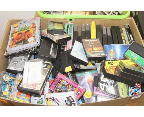 A collection of mixed vintage video games, to include Super Mario Brothers 3 for the NES, and various Sinclair and Nexus game