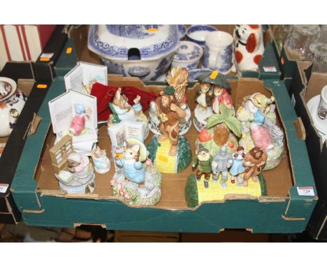 A collection of music boxes, to include Border Fine Arts World of Beatrix Potter and Wizard of OzWizard of Oz clock – two tin