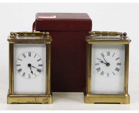 An early 20th century French lacquered brass carriage clock, having single barrel going eight-day movement, h.12cm; together 