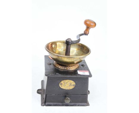 A vintage cast iron coffee grinder, height 21cm