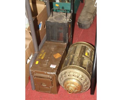 A repousse decorated brass hanging lantern, h.39cm; together with another lantern; and an ammunition box