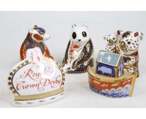 A collection of three Royal Crown Derby models of bears, together with a further Royal Crown Derby model of Noah's Ark and a 