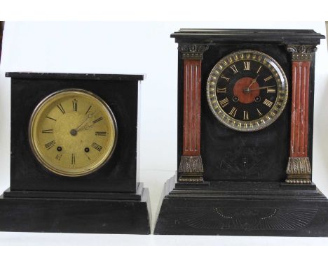 A late Victorian polished black slate, rouge marble and gilt metal mounted mantel clock, finely engraved with Egyptian hierog