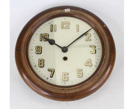 A circa 1930s Smiths beechwood cased kitchen clock, having reverse painted glass dial and eight-day movement, dia.28cm