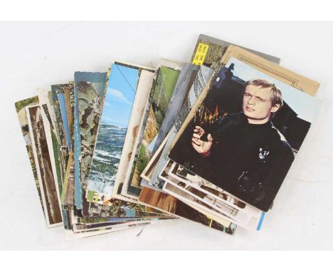 A collection of mainly 20th century postcards to include topographical views and portrait examples