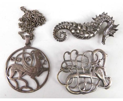 A Scottish silver brooch; together with a pendant brooch on chain; and a base metal brooch modelled as a seahorse (3)