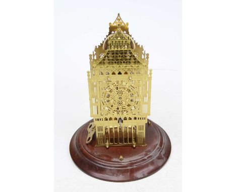 A 20th century brass mantel clock in the form of Big Ben, housed under a glass dome, height 28cm