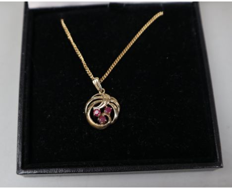 9ct gold ruby set pendant on 9ct gold chain - Approx gross weight: 5.8g 