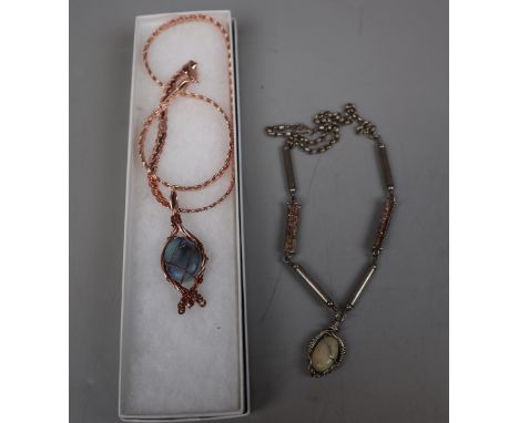 1 silver necklace with Ethiopian opal, 1 gold plated ladies necklace with Australian Lightning Ridge opal 