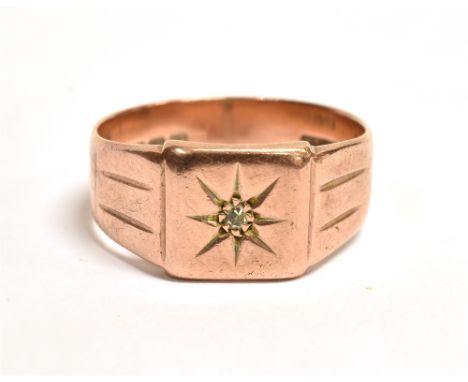 A STAR SET DIAMOND ROSE GOLD SIGNET RING  The ring with grooved shoulders and shank marked for Birmingham 1926, maker H.C. &a