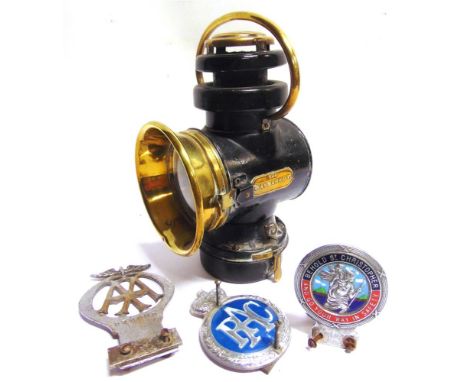 AUTOMOBILIA - A MOTOR CAR LAMP, 'THE HAYMARKET'  with brass fittings and a twist-fit reservoir to the base, overall 27cm high