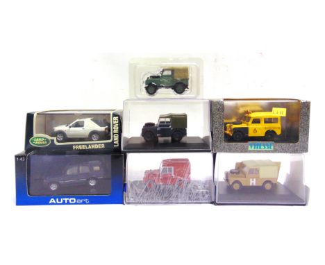 SEVEN 1/43 SCALE DIECAST MODEL LAND ROVERS  by Oxford Diecast (3), Auto Art (1), Vitesse (1), and others (2), each mint or ne