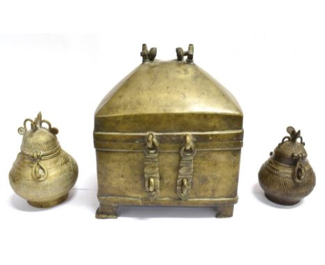 TWO BENIN BRONZE CASKETS  the hinged covers with zoomorphic knops, 15cm and 13cm, together with a domed casket with twin hasp