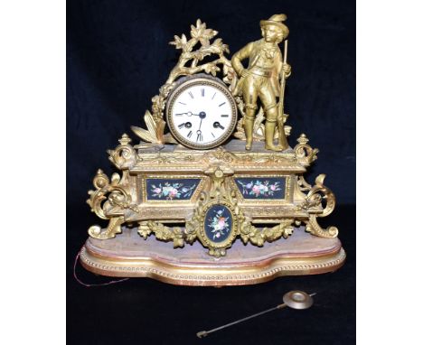 A LATE 19TH CENTURY FRENCH GILT METAL CASED MANTLE CLOCK  the 8-day movement striking on a bell, 37cm wide Condition Report :