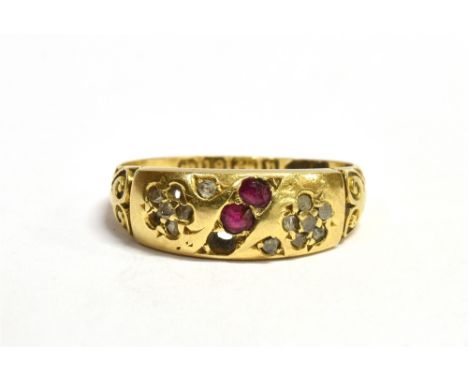 AN 18CT GOLD DIAMOND AND RUBY DRESS RING  the shank marked for Birmingham 1902, ring size N-N ½ , weight 3.1grams Condition R