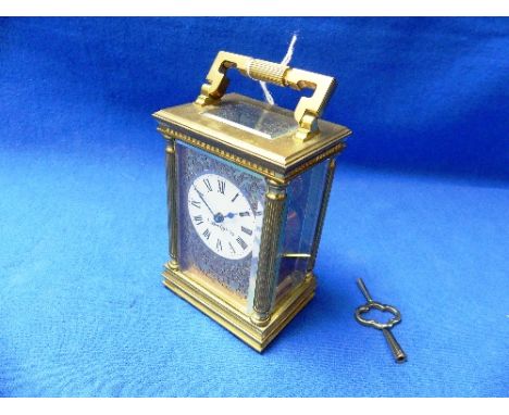 An early 20th century gilt brass five-glass Carriage Clock, 1¾in (4.5cm) circular enamel dial inscribed Mappin &amp; Webb Ltd