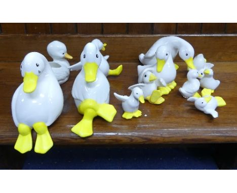 A collection of ceramic Ducks, mostly by Devon Ceramics Ltd., all white painted with orange beaks and black eyes, some adult 