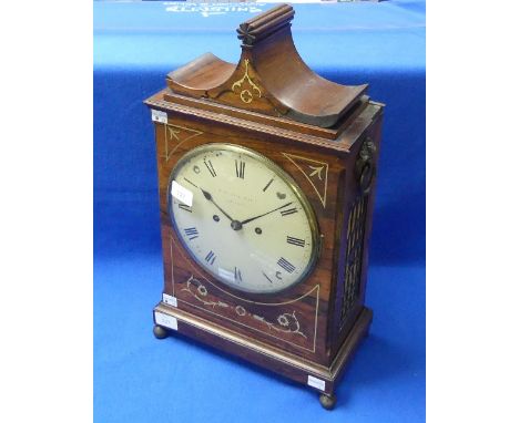 W. H. Bagnall, London: a Regency rosewood pagoda top Bracket Clock with brass inlays, circular dial and black Roman numerals,