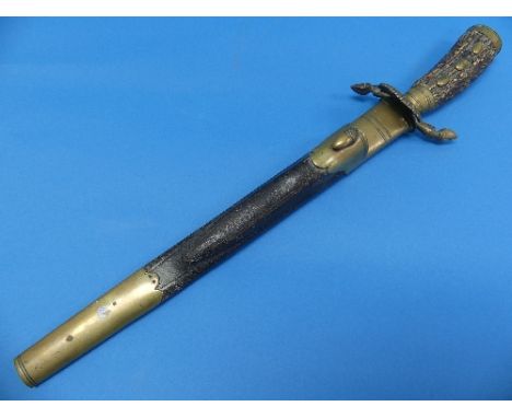An early 20thC German Hunting Dagger, with antler grip, the brass crossguard in the form of hooves, the blade etched with a h