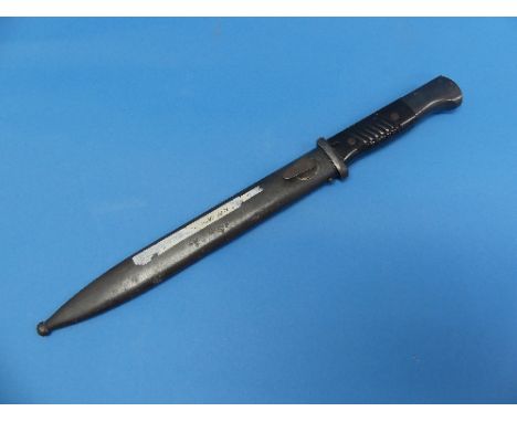 A German W.W.2 period K98 Bayonet, the blade marked for 'E.Pack  &amp; S' and 1520, the scabbard correspondingly marked 1520 