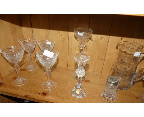 A small quantity of Cut-glass, including a set of four Champagne Glasses, a silver-topped Salt Shaker, a cut-glass bowl, a Na