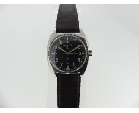 A 1970's Hamilton military issue stainless steel manual wind Wristwatch, the circular black dial with Arabic numerals and lum