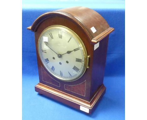 An early 20th century mahogany cased chiming Bracket Clock by Gustav Becker, of arched form with walnut panels and brass stri