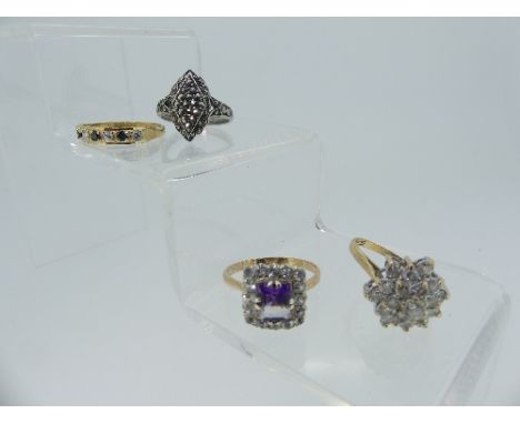 Three 9ct yellow gold Rings; one set white paste cluster, one sapphire and white paste, the other purple and white pastes, to