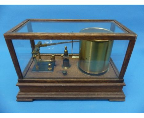 An early 20th Century oak cased Barograph, by R. Bailey, 14 Bennetts Hill, Birmingham, raised on four bracket feet, 12½in (32