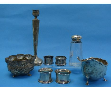 A quantity of Damaged / Scrap Silver, including capstan inkwell, four napkin rings, sauce boat, handle broken, candlestick, e