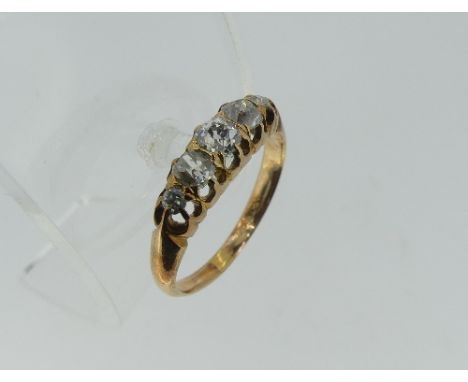 A small graduated five stone diamond Ring, the old cut stones claw set in yellow metal, marks rubbed, Size L.