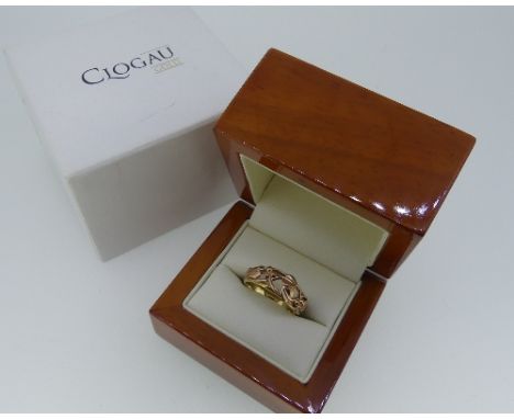 Clogau Gold; A 9ct yellow and rose gold 'Tree of Life' Ring, the pierced foliate rose gold front on a yellow gold shank, Size