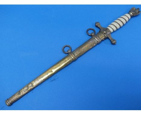 A German W.W.2 period Naval (Kriegsmarine) Officer's Dress Dagger, with wire banded celluloid grip, eagle pommel holding a wr