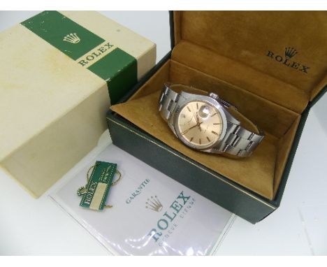 A Rolex Oysterdate Precision stainless steel gentleman's Wristwatch, the signed champagne dial with gilt baton markers, centr