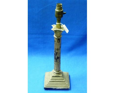 An Edwardian silver Column Candlestick, by George Nathan &amp; Ridley Hayes, hallmarked Birmingham, 1907, with stepped square