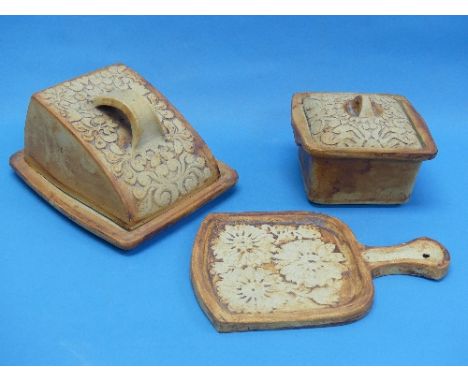 Quantock Pottery: a cheese dish, cheese board, and a butter dish and cover, together with a large copper charger, brass chest