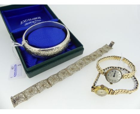 A hinged silver Bangle, hallmarked Birmingham 1971, 48g, in fitted box, together with a silver filigree bracelet, marked 800,