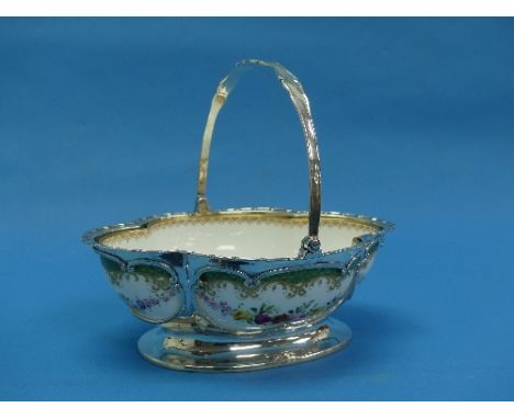 An Edwardian silver mounted Royal Worcester quatrefoil Dish, the pierced silver frame with swing handle by William Henry Spar