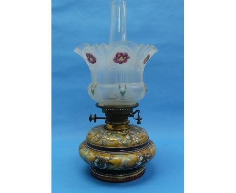 A Doulton Lambeth stoneware Oil Lamp, by Edith Lupton, of squat circular form incised with all-over floral decoration, impres